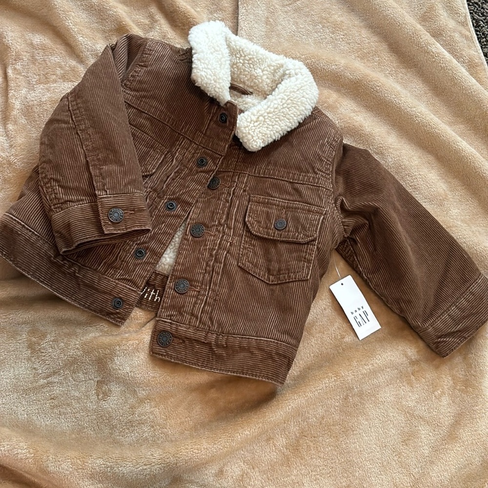 Baby Gap brown corduroy and Sherpa lined coat. NWT. Snap front closure.